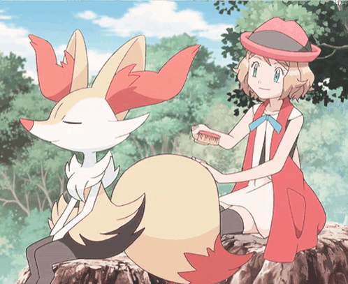 Girl In Red Hat Brushing Fox Fur GIF
