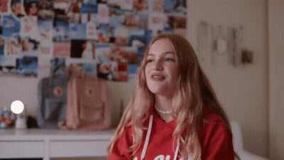 A Girl In A Red Hoodie With The Name Liv On The Bottom GIF