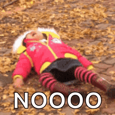 A Girl In A Red Jacket Is Laying On The Ground With The Words Noooo Written On The Bottom GIF