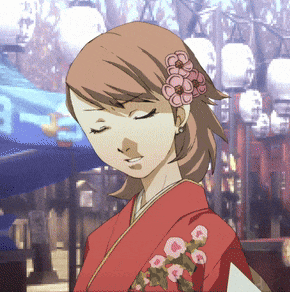 A Girl In A Red Kimono With Flowers In Her Hair GIF