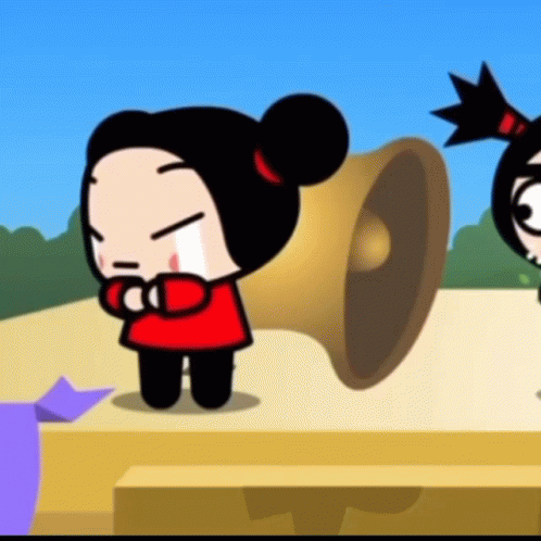 A Girl In A Red Shirt Is Crying In Front Of A Large Speaker GIF