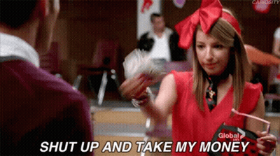 A Girl In A Red Shirt Is Holding A Bunch Of Money And Says Shut Up And Take My Money GIF
