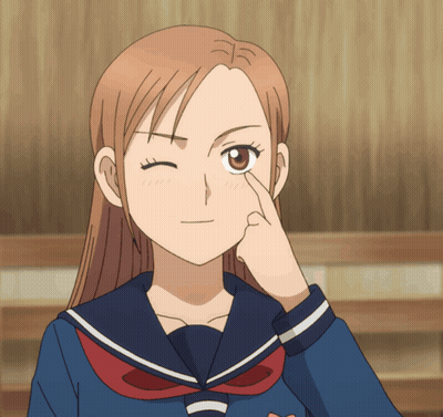 A Girl In A Sailor Suit Winks Her Eye GIF