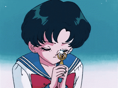 A Girl In A Sailor Uniform Is Holding A Magnifying Glass GIF