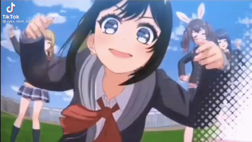 A Girl In A School Uniform And Tie Is Pointing At The Camera While Standing In A Field . GIF