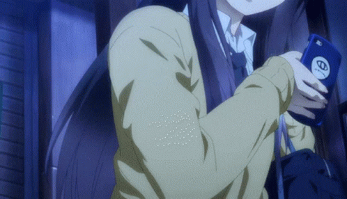 A Girl In A School Uniform Is Holding A Cell Phone With The Letter O On It GIF