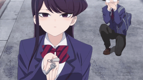 A Girl In A School Uniform Is Holding Keys In Her Hand GIF