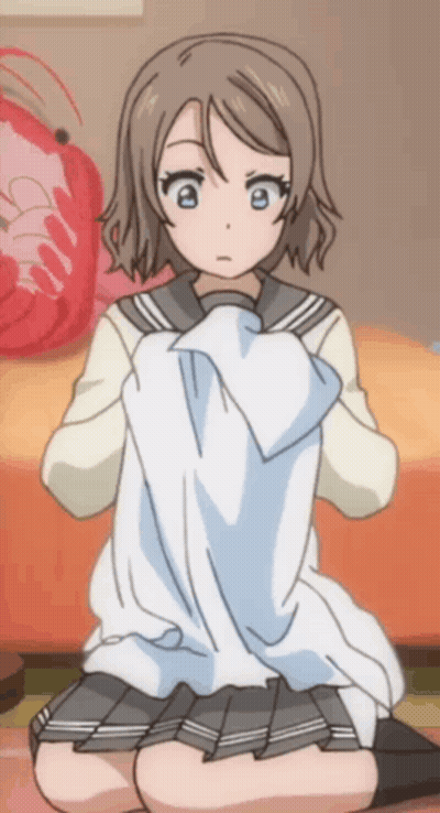 A Girl In A School Uniform Is Kneeling Down Holding A White Cloth GIF