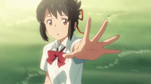 A Girl In A School Uniform Is Reaching Out Her Hand Towards Something GIF
