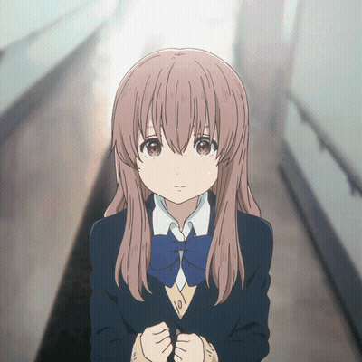 A Girl In A School Uniform With A Blue Bow Tie Is Standing In A Hallway GIF