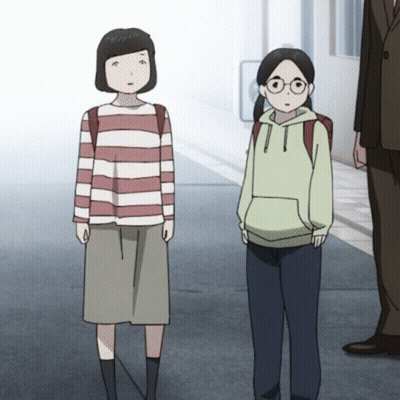 A Girl In A Striped Shirt And A Girl In A Green Hoodie Are Standing Next To Each Other On A Sidewalk GIF
