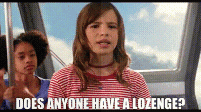 A Girl In A Striped Shirt Is Riding A Cable Car And Asking Does Anyone Have A Lozenge ? GIF