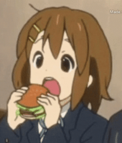 A Girl In A Suit Is Eating A Hamburger GIF