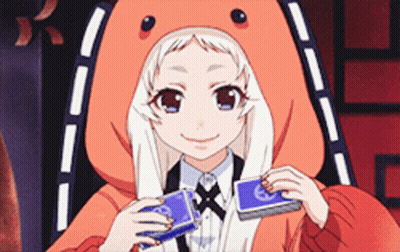 A Girl In A Teddy Bear Costume Is Holding Two Playing Cards GIF