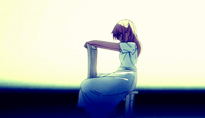 A Girl In A White Dress Sits On A Stool GIF