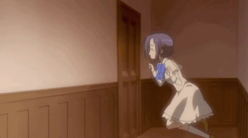 A Girl In A White Dress Stands In A Hallway GIF
