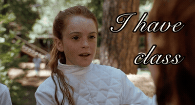 A Girl In A White Jacket With The Words " I Have Class " Above Her GIF