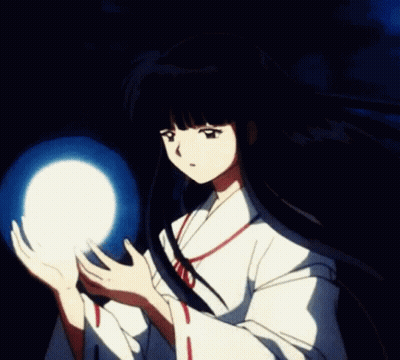 A Girl In A White Kimono Is Holding A Light In Her Hands . GIF