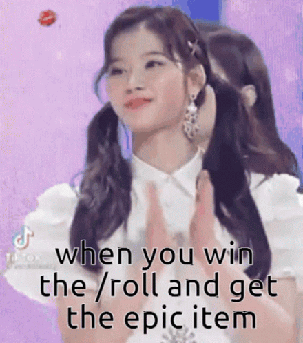 A Girl In A White Shirt Is Clapping Her Hands And Says `` When You Win The Roll And Get The Epic Item '' GIF