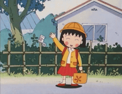 A Girl In A Yellow Hat Is Holding A Bottle And A Bag In Front Of A House . GIF