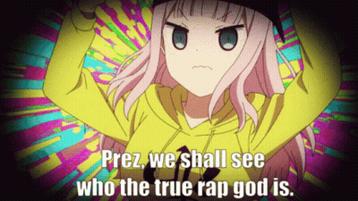 A Girl In A Yellow Hoodie With The Words " Prez We Shall See Who The True Rap God Is " Above Her GIF