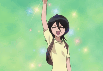 A Girl In A Yellow Shirt Is Holding A White Hat In The Air GIF