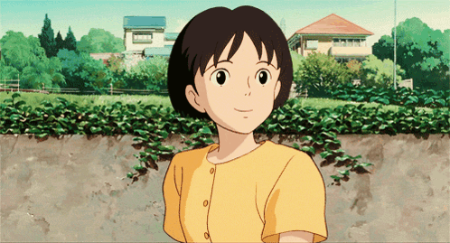 Girl In Yellow Smiling At House GIF