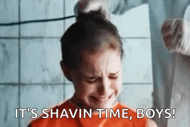 A Girl Is Crying While Getting Her Hair Shaved . GIF