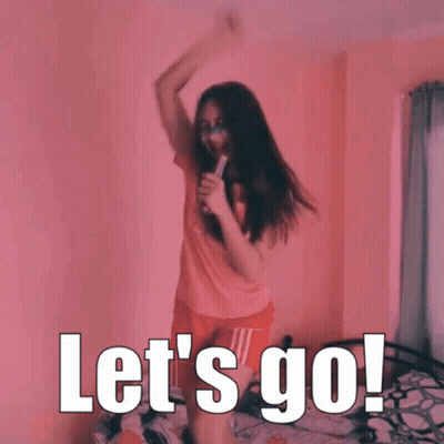 A Girl Is Dancing With The Words Let 'S Go Written In White GIF