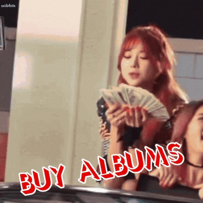 A Girl Is Holding A Bunch Of Money And The Words Buy Albums Are Above Her GIF