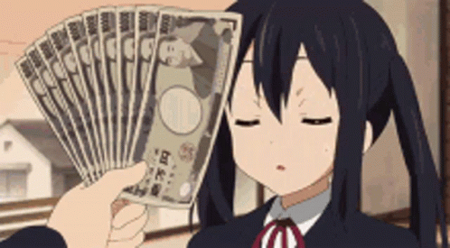 A Girl Is Holding A Bunch Of Money In Her Hand . GIF