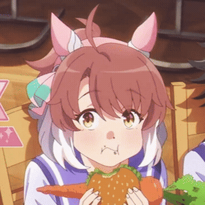 A Girl Is Holding A Carrot And Lettuce In Her Hands GIF