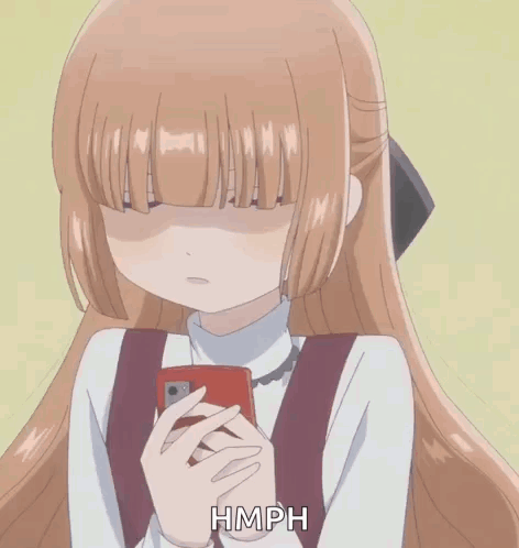 A Girl Is Holding A Cell Phone And Making A Funny Face While Saying Hmph GIF