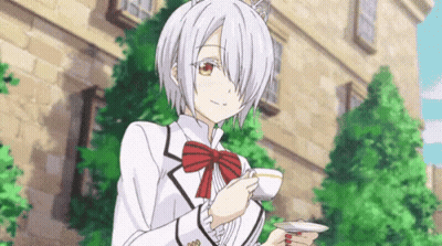 A Girl Is Holding A Cup Of Tea In Front Of A Building . GIF