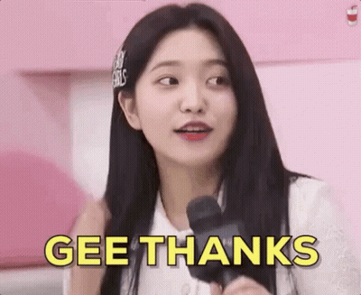 A Girl Is Holding A Microphone And Saying Gee Thanks . GIF