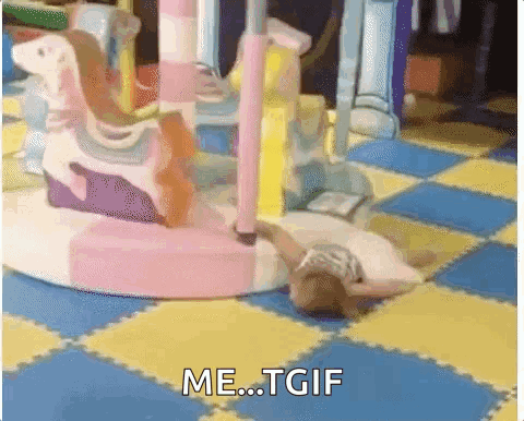 A Girl Is Laying On The Floor In Front Of A Merry Go Round With The Words Me ... Tgif Written On It . GIF