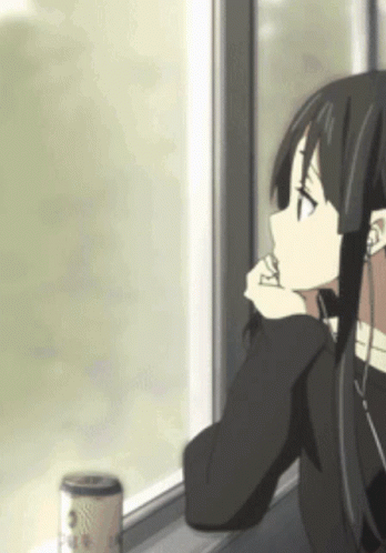 A Girl Is Looking Out Of A Window With A Can Of Coffee In The Foreground GIF