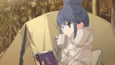 A Girl Is Reading A Book And Drinking From A Mug In Front Of A Tent GIF