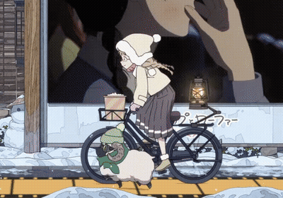 A Girl Is Riding A Bike With A Sheep On The Front GIF