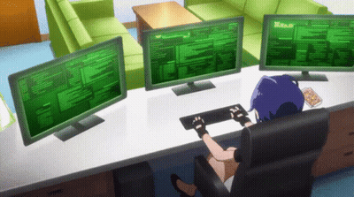 A Girl Is Sitting At A Desk Using A Computer With Three Monitors GIF