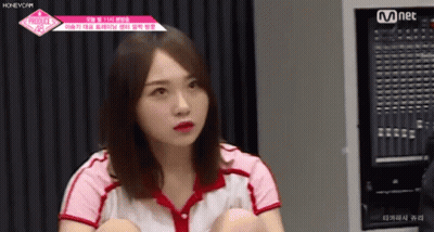 A Girl Is Sitting In Front Of A Mnet Mixer GIF
