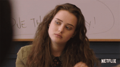 A Girl Is Sitting In Front Of A Whiteboard That Says Due This GIF