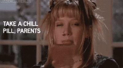 A Girl Is Sitting In Front Of A Window With Her Eyes Closed And A Book In Her Hand . GIF