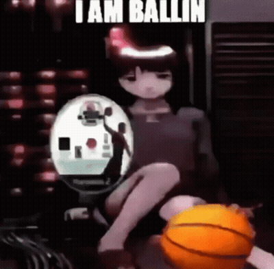 A Girl Is Sitting Next To A Basketball With The Words `` I Am Ballin '' Written On The Bottom . GIF