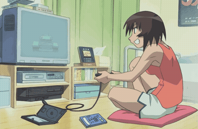 A Girl Is Sitting On The Floor Playing A Video Game With A Book Laying On The Floor That Says Dragon Ball GIF