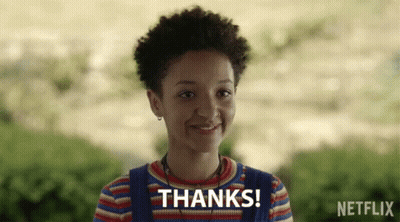 A Girl Is Smiling With The Words Thanks Written Above Her GIF