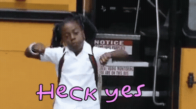 A Girl Is Standing In Front Of A Yellow School Bus With The Words Heck Yes Written On It GIF