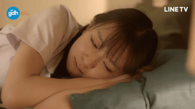A Girl Laying On Her Stomach With A Line Tv Logo In The Background GIF