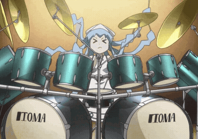 A Girl Playing Drums With A Drum Set Made By Itoma GIF