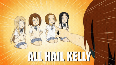 A Girl Pointing At A Group Of Girls With The Words All Hail Kelly GIF